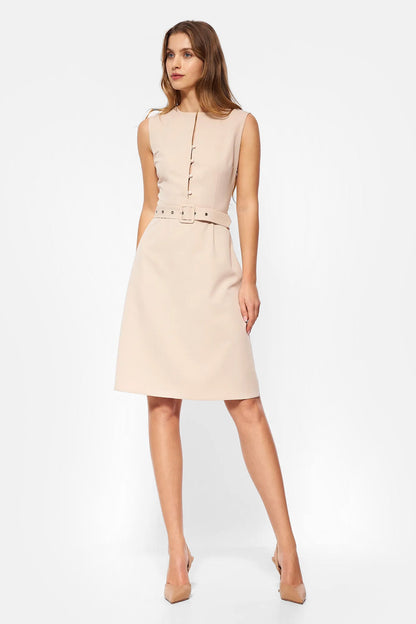 Dress with a lowered waist and pleats
