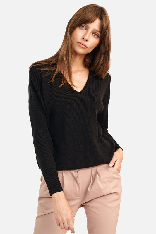 Black sweater with a free cut