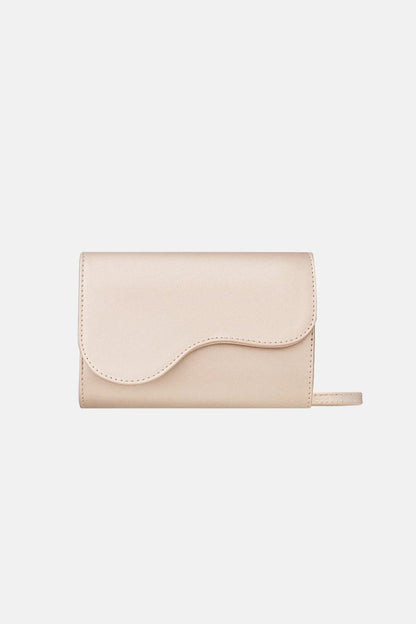 Platinum handbag with decorative flap
