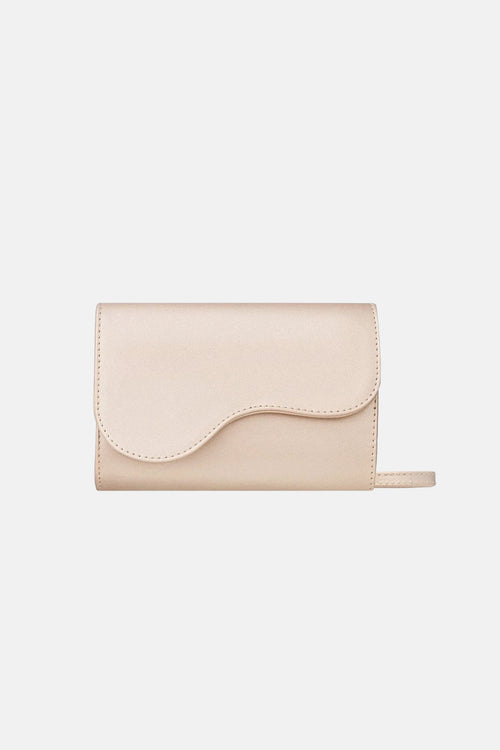 Platinum handbag with decorative flap
