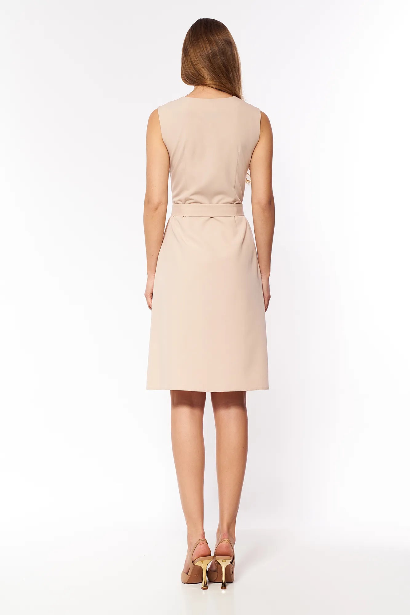 Dress with a lowered waist and pleats