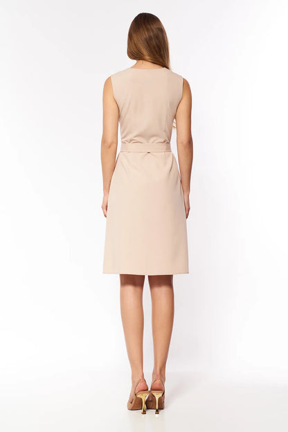 Dress with a lowered waist and pleats